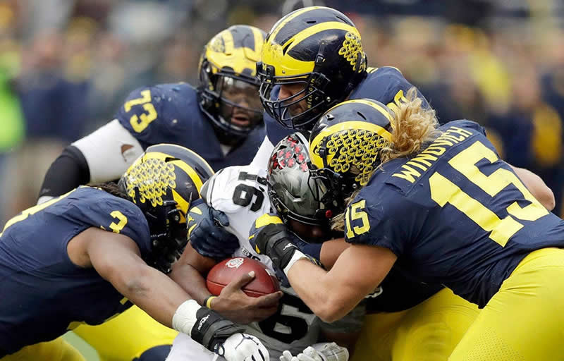 Michigan trolls rival Ohio State over its effort to trademark the word &apos;THE&apos;